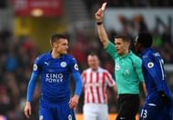 STOKE ON TRENT, ENGLAND - DECEMBER 17: Jamie Vardy of Leicester City (L) is shown a red card by referee Craig Pawson during the Premier League match between Stoke City and Leicester City at Bet365 Stadium on December 17, 2016 in Stoke on Trent, England.  (Photo by Michael Regan/Getty Images)